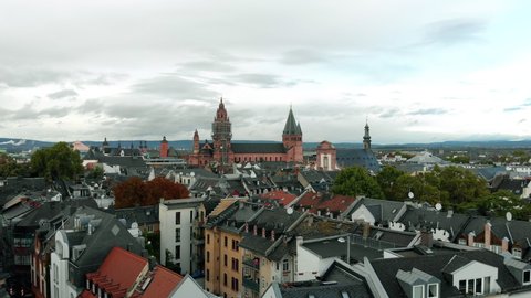 Aerial pedestal shot of the Old Town of Mainz Germany during the day.