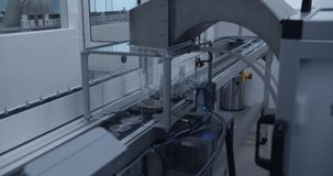 Medical laboratory with working chemical conveyor. 4K video