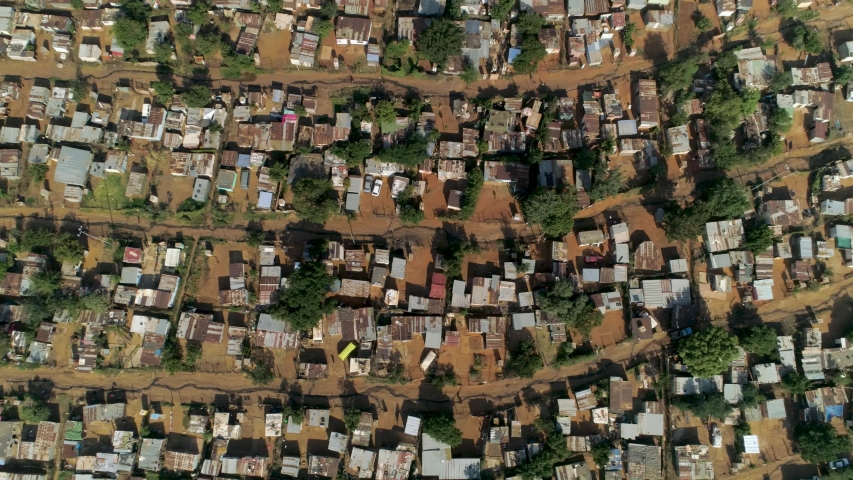 Aerial view of an informal settlement in Soweto, South Africa. Also known as a squatter camp or shanty town, these settlements are characterised by impoverished communities living in shacks. 