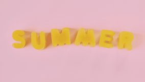 Stop motion animation video of melting yellow letters made of ice says summer
