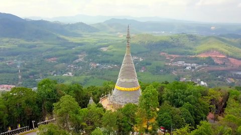 Kho Hong / Thailand     10.22.2019  , Aerial video of King Bhumibol Temple ,  Stainless steel temple in Hat Yai , taken by Drone Camera from above   