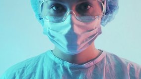 Pandemic virus outbreak. Doctor portrait. Female medical worker in protective face mask goggles. - Powered by Shutterstock - Get 15% off with code: PIKWIZARD15