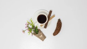 Coffee cup with sweet sticks on wooden table background. *UHD.