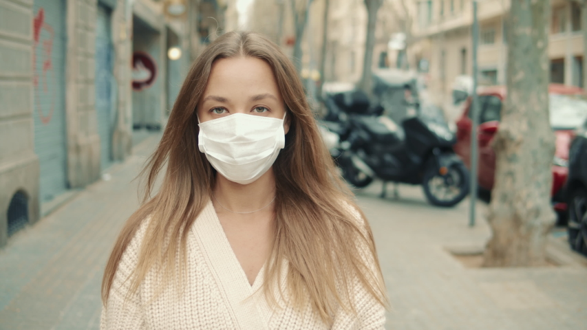 Virus mask spanish woman on street wearing face protection in prevention for coronavirus covid 19. Lady walking in public space on quarantine for food Royalty-Free Stock Footage #1048830811
