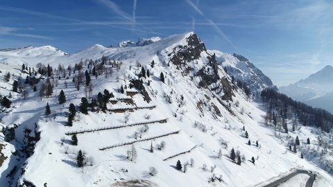 Avalanche snow bridge in the alps, aerial of avalanche protection in winter 4K