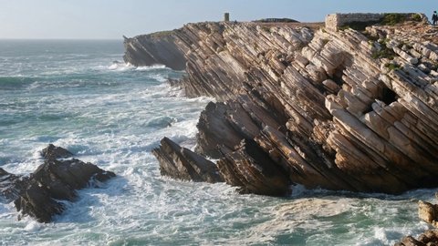 Rocks of Baleal Island in the waters of Atlantic ocean. Peniche, Portugal