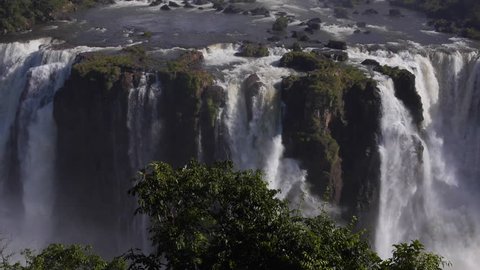 Iguazu Falls, one of the world's great natural wonders, on the Border of Brazil and Argentina - camera tilt.