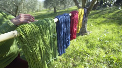 Natural wool dyeing in a carpet factory, Italy. tradition handicraft color indigo