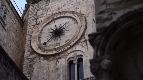 Tower clock. Diocletian's Palace. Split Old Town, Croatia. Travel destination for tourist visiting Croatia. Europe summer tourism.