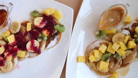 Vegan Pancakes With Fruits, Berries, Maple Syrup And Peanut Butter. 