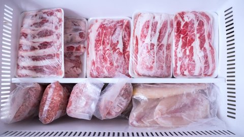 Stop motion animation of variety fresh meats in and out on shelf of refrigerator
