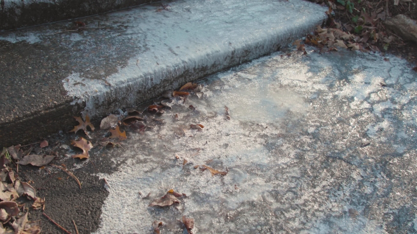 Ice on Stone Stairs Outside in the Winter Pan