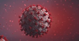 4k video of 3d made coronavirus (COVID-19) floating on a red background.