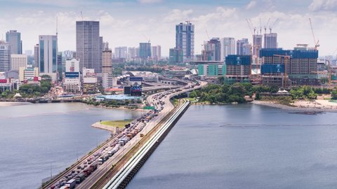 Malaysia - March 2019: 4K Day timelapse of the Causeway of Johor, Malaysia linking to Singapore. The buildings in the foreground is Johor, Malaysia.