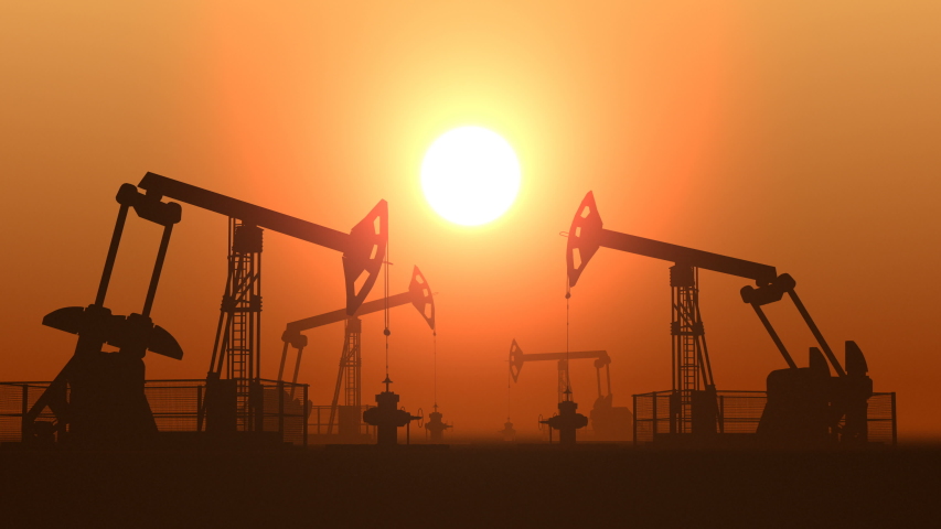 Working oil pump jacks in a desert against sunset extracting crude oil. Pumping fossil oil is one of the methods of energy generation from renewable energy sources. Loopable animation. Royalty-Free Stock Footage #1048892518