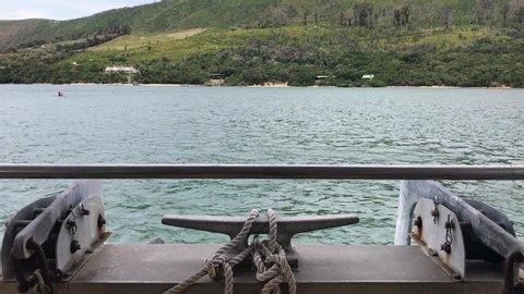 Bow of shuttle ferry with large cleat and ropes in Knysna, S Africa