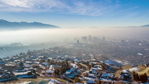 Sunrise Hyperlapse of Downtown Salt Lake City on Winter Morning with Inversion
