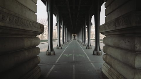 Paris, France - 03 20 2020: Deserted Bir Hakeim bridge during coronavirus / Covid19 lockdown in Paris, France