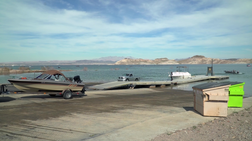 Backing boat on trailer down a boat launch at Lake Mead - Nevada