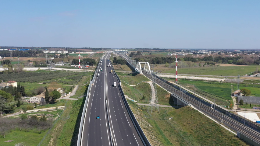 Montpellier low traffic on highway during lockdown only trucks aerial shot pandemic state of emergency France Royalty-Free Stock Footage #1048946569