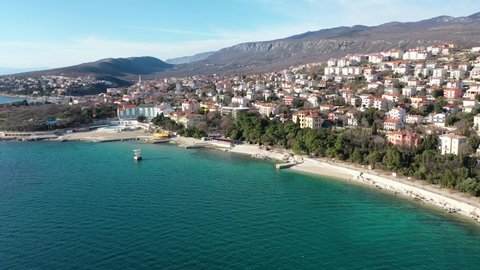 Novi Vinodolski, city in Croatia on adriatic sea. View from above arial on main beach.