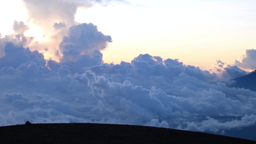 Volcanic chain at sunset and panoramic view of Lake Atitlán