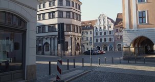 A view across the Untermarkt in the german city Goerlitz. Wes Anderson shot The Grand Budapest Hotel in Goerlitz. The streets are empty due to safety regulations during the corona crisis. 4K-Clip.
