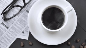 slow motion top view of coffee pour into cup from turk coffee make on the table with props 4k