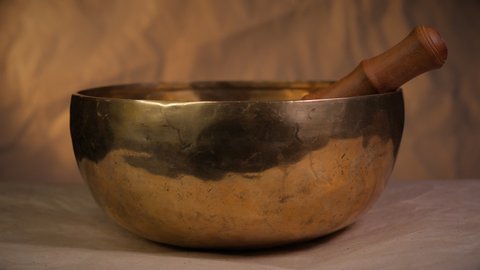 Tibetan singing bowl for meditation. Inside the bowl is a stick.