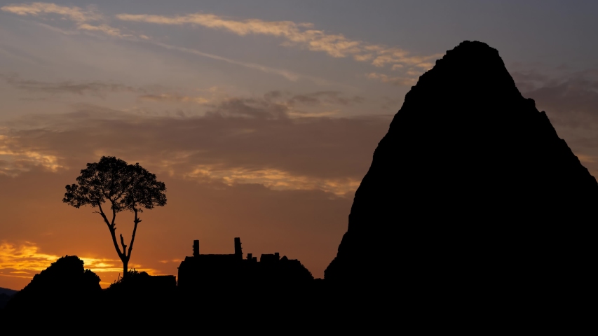 Machu Picchu: Ruins of the Lost Inca City, Time Lapse at Sunrise with Colorful Clouds and beautiful mountains Huayna Picchu, Peru