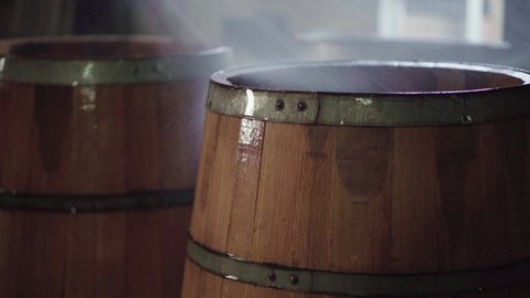 Wooden barrels being soaked with water