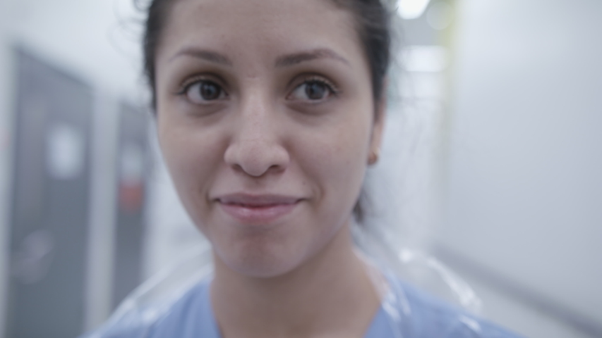 Closeup of happy nurse in corridor Royalty-Free Stock Footage #1049010784