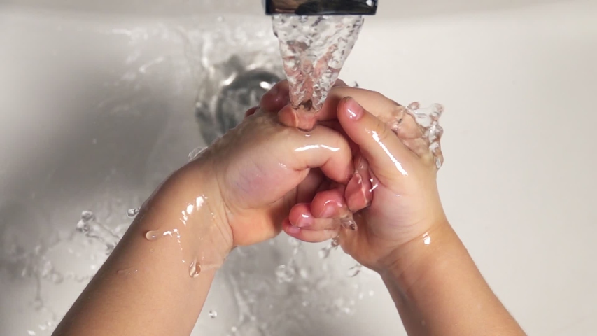 Cute little girl washing her hands with a hand wash gel in sink. Clean hand concept idea.   Coronavirus protection.
  | Shutterstock HD Video #1049016070