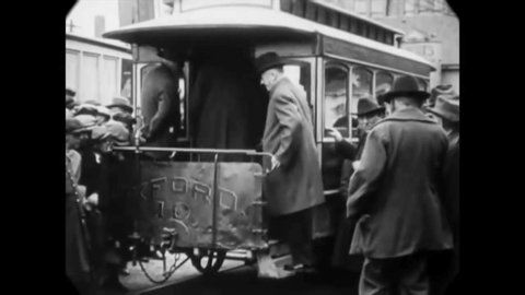 CIRCA 1921 - Edwin Macy, Robert Cook, and George Jennings board a horse-drawn tram in New Bedford, Massachusetts.