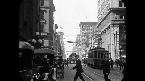 CIRCA 1925 - Vehicular traffic is seen in Ottawa and Toronto, Ontario, Canada.