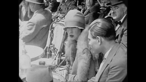 CIRCA 1927- Patrons are served drinks outdoors at the Cafe de la Paix in Paris, France.