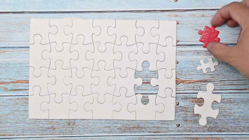 Puzzle for teamwork achievement. Playing jigsaw game. Business successful and goal concept Royalty-Free Stock Footage #1049059159