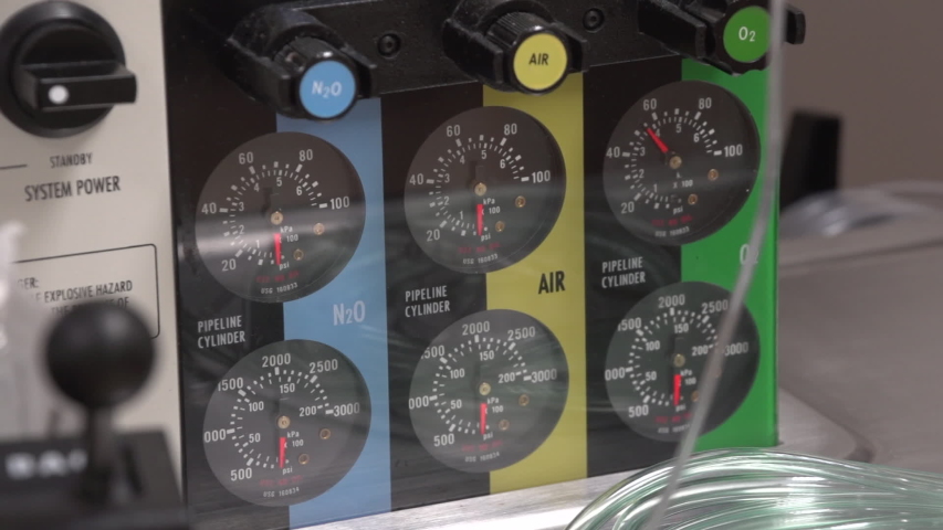 Slow pan across medical gas gauges
