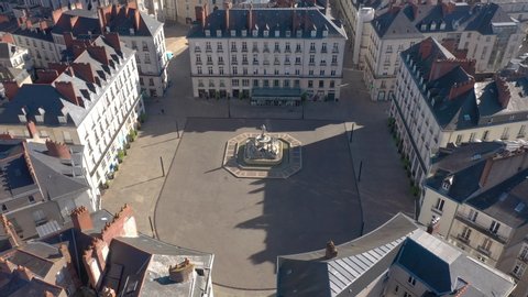 Nantes / France - March 2020: empty aera due to Coronavirus Covid-19 lockdown, Fontaine de la Place Royale, drone aerial view