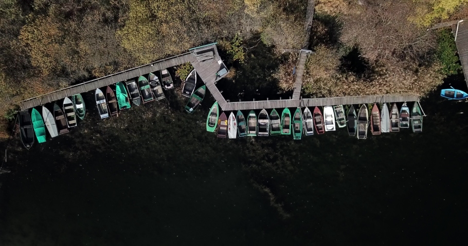 Small boats on dark lake in South Tyrol
