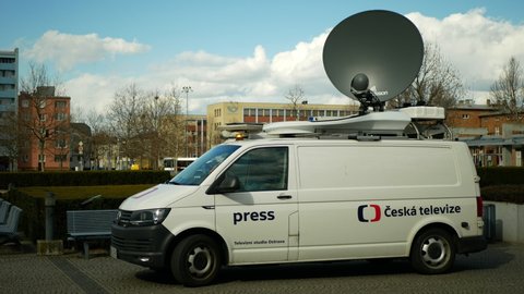 OLOMOUC, CZECH REPUBLIC, JANUARY 3, 2020: Satellite TV car for live broadcasting to television, modern satellite connection transmitter, news antenna warning beacon, technology equipment