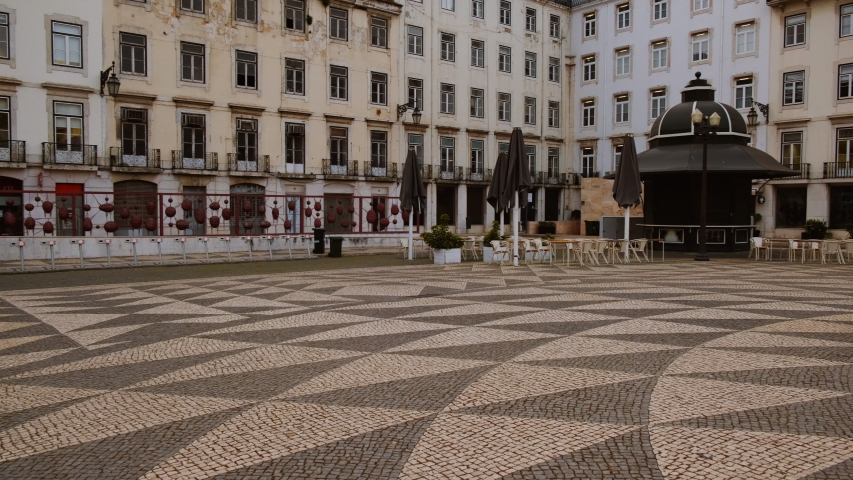 EUROPE IN LOCKDOWN - A popular square of a Mediterranean capital lies deserted, following the rise in the number of cases of CORONAVIRUS / COVID-19 infections, with a dramatic impact on social life Royalty-Free Stock Footage #1049117203