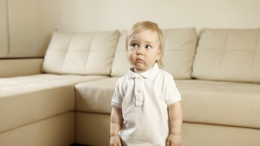 Child on white sofa | Shutterstock HD Video #10491245
