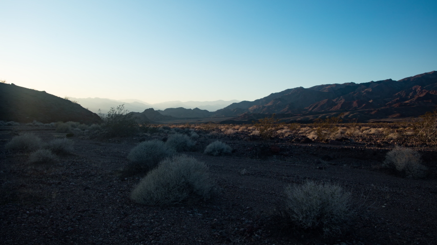 A day to night time lapse near Jubilee Pass looking west towards the Panamint Range in Death Valley National Park, California