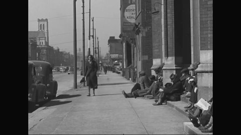 CIRCA 1930s - Unemployed and homeless men are seen on Chicago streets during the Great Depression in America.