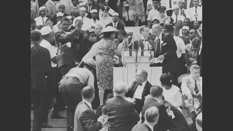 CIRCA 1963- Marchers are shown as well as the Washington Monument and singer Marian Anderson takes the stage during the March on Washington.