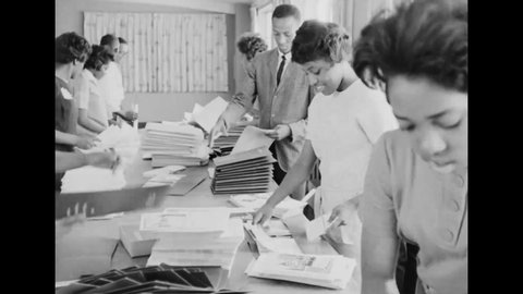 CIRCA 1963 - Activists prepare folders to be distributed with information about the March on Washington civil rights protest.