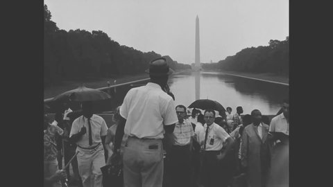 CIRCA 1963 - Civil rights organizers are shown with crowds at the Washington Monument and signs are readied for the March on Washington.