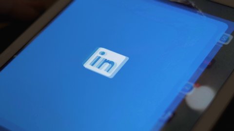 Sofia, Bulgaria-23 03 2020: Starting Linkedin social media platform. Linkedin logo and app on tablet dispaly