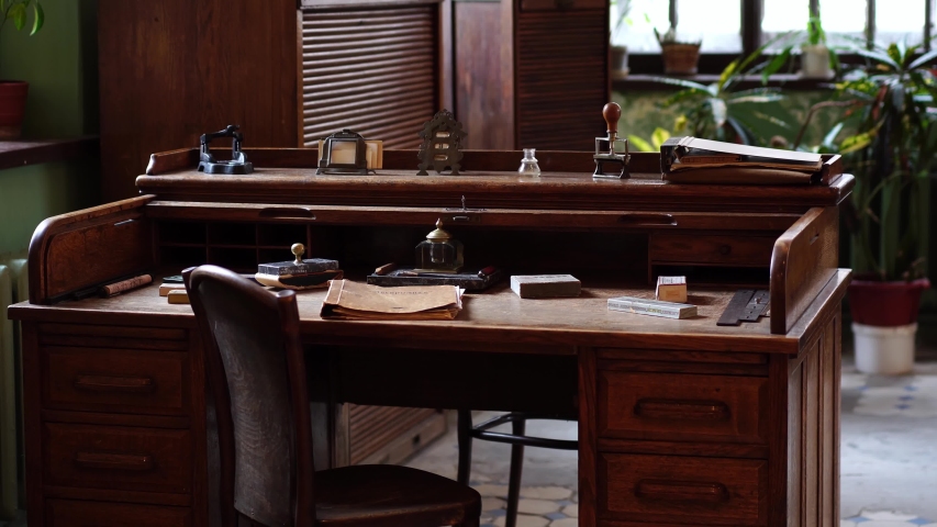 Antique desk at a Soviet printing press factory in Russia.  Old fashioned printshop, publication & typography, publishing industry. 